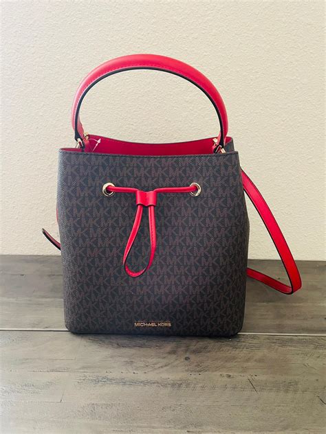 bolsa michael kors roja original|Michael Kors bolso negro.